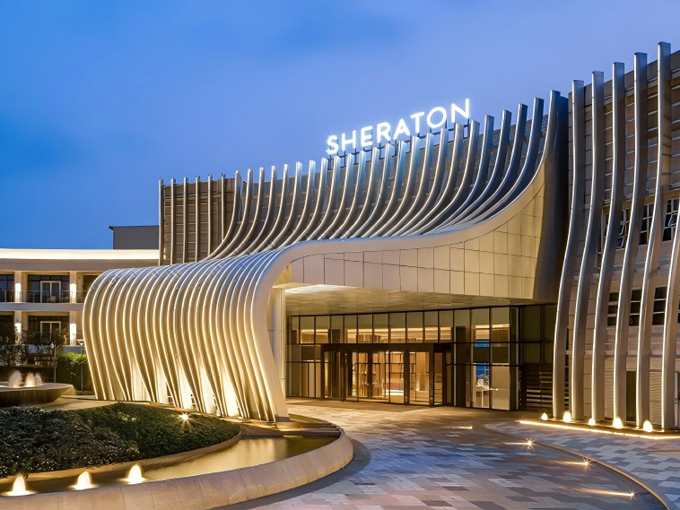 2modern-hotel-entrance-facade-with-curved-lighting