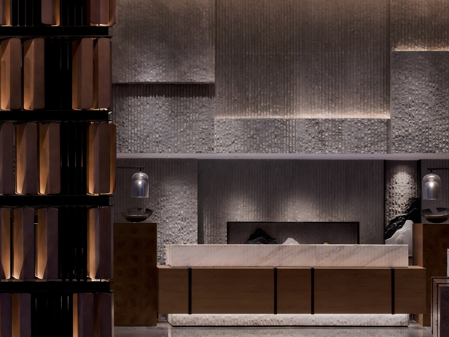 3luxury-hotel-lobby-reception-desk-with-stone-wall