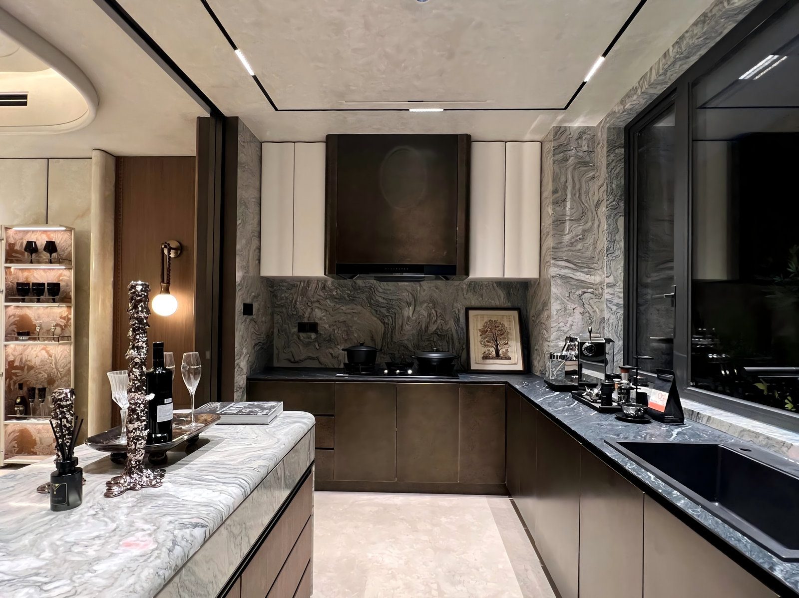 luxury-kitchen-with-marble-island-and-dark-cabinets