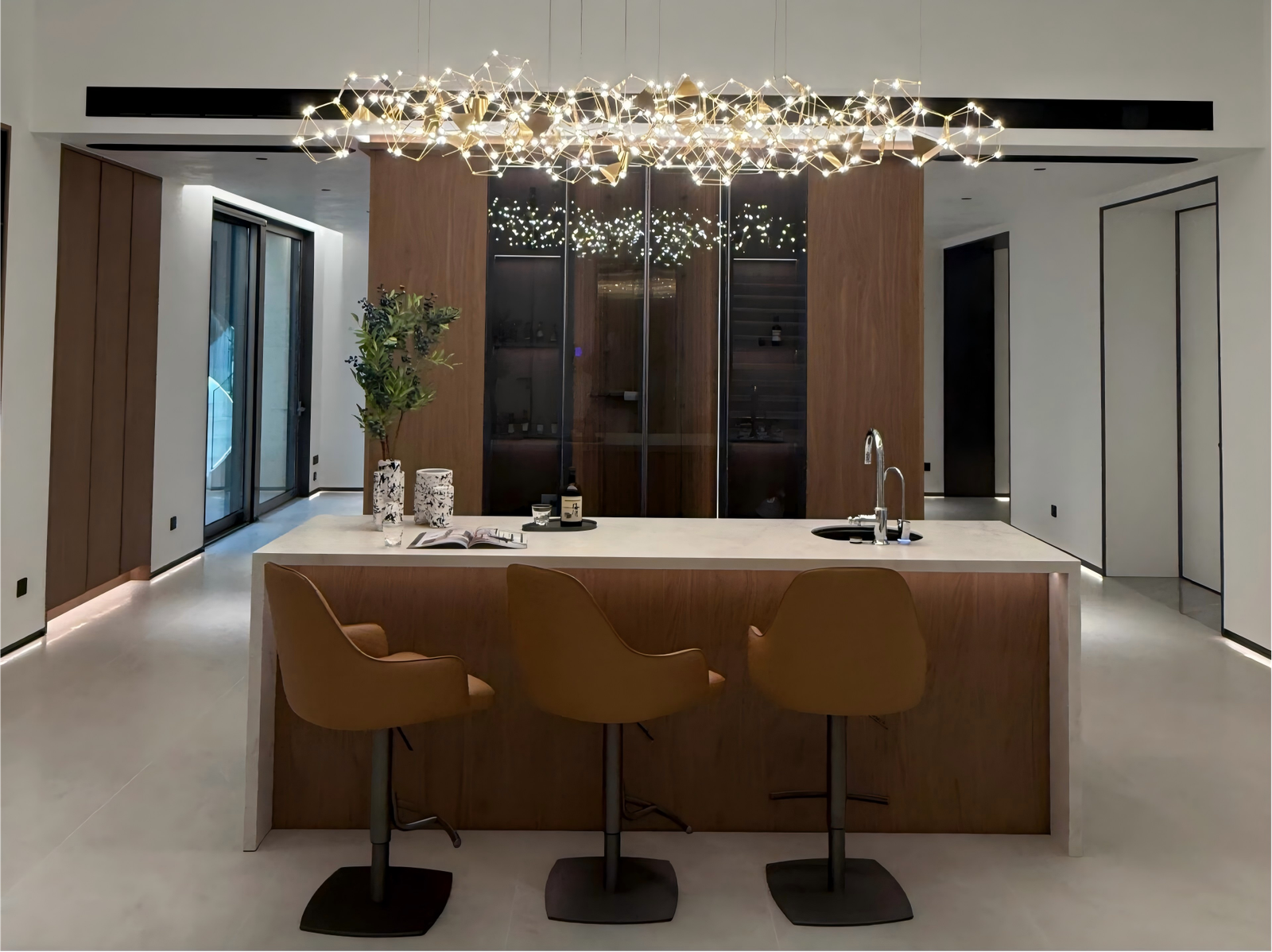 modern-kitchen-island-with-bar-seating-and-chandelier