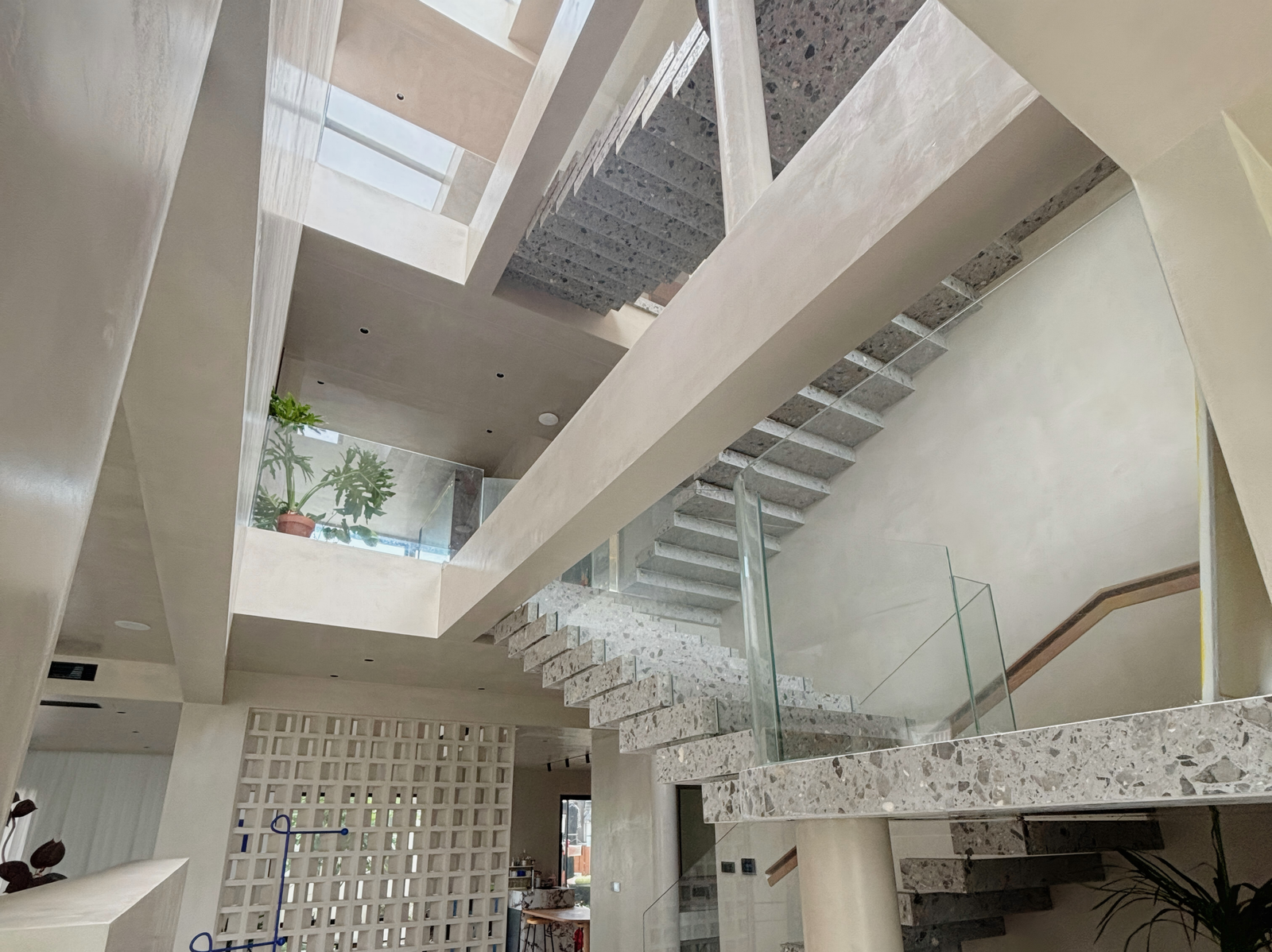 modern villa floating staircase with terrazzo steps scaled modern-villa-floating-staircase-with-terrazzo-steps