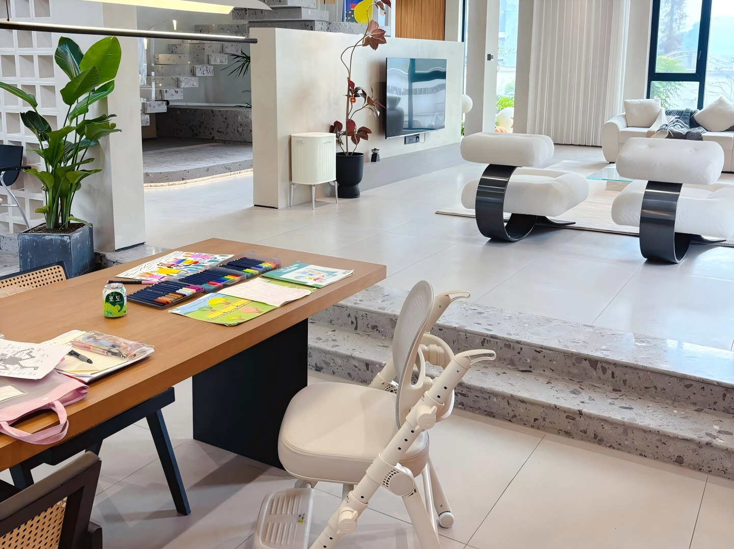 modern villa living room with tv wall and white lounge chairs modern-villa-living-room-with-tv-wall-and-white-lounge-chairs