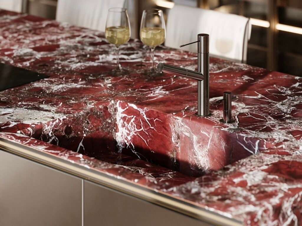 red marble kitchen countertop with integrated sink