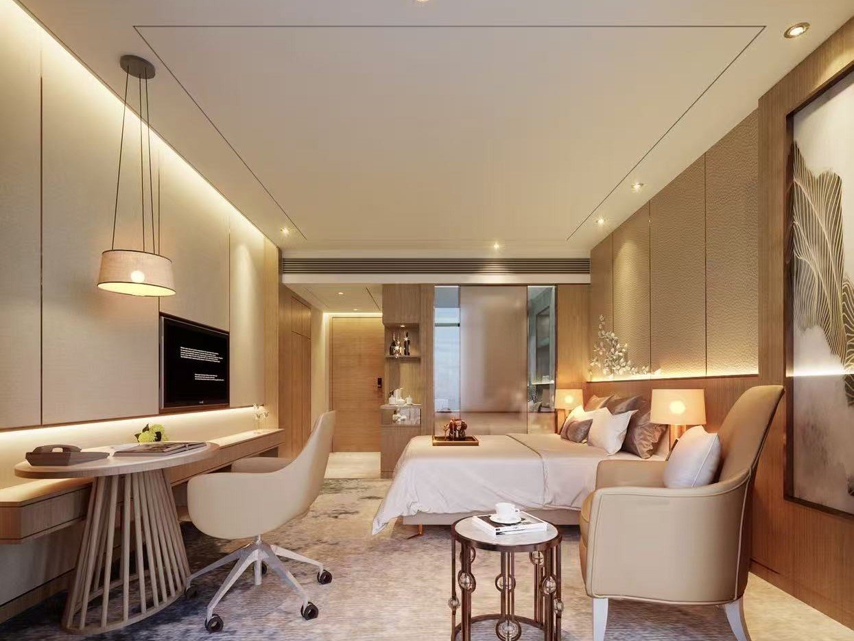 warm-hotel-suite-bedroom-and-workspace