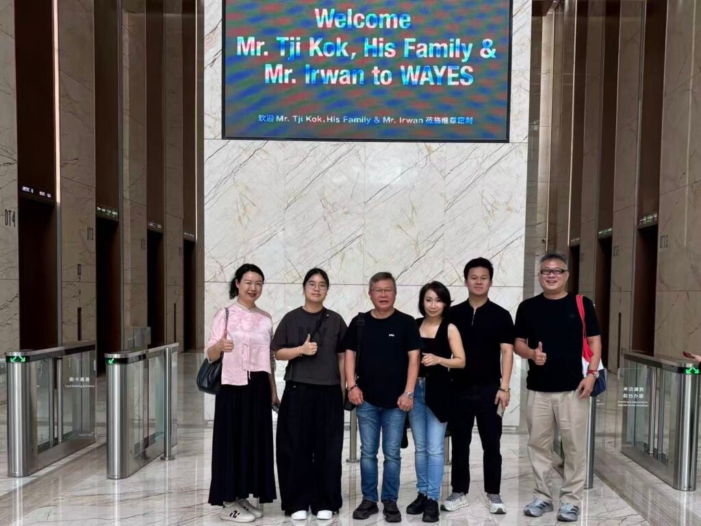 Boyce team posing with overseas clients, representing long-term partnership and comprehensive after-sales support.