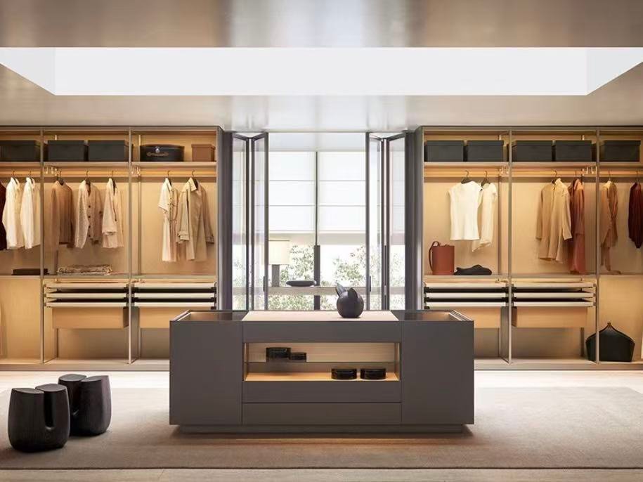 Luxury built-in wardrobe with glass doors and island