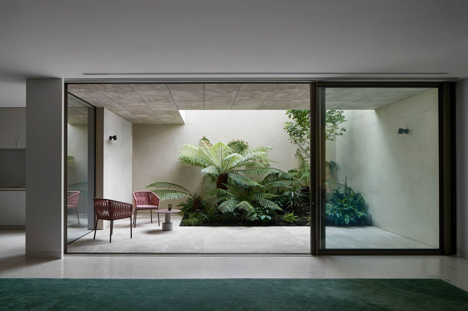 Aluminum sliding window courtyard view interior