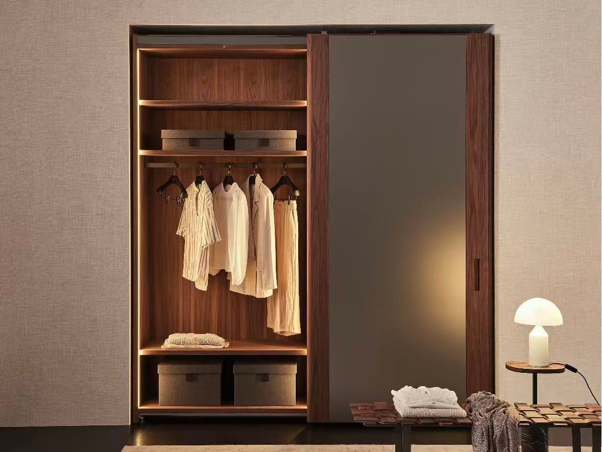 Wooden sliding wardrobe with LED lighting