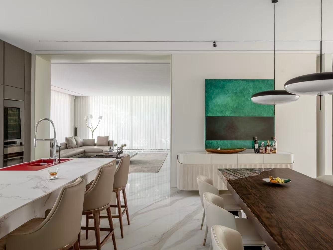 Modern villa kitchen with custom dining space