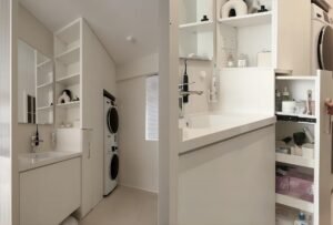 small apartment bathroom laundry storage.jpg Small apartment bathroom and laundry storage solution