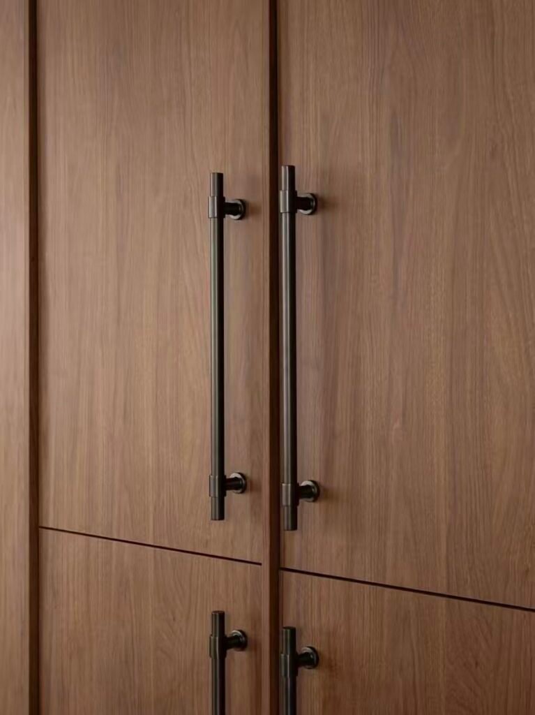 Walnut wood grain kitchen cabinet surface detail closeup