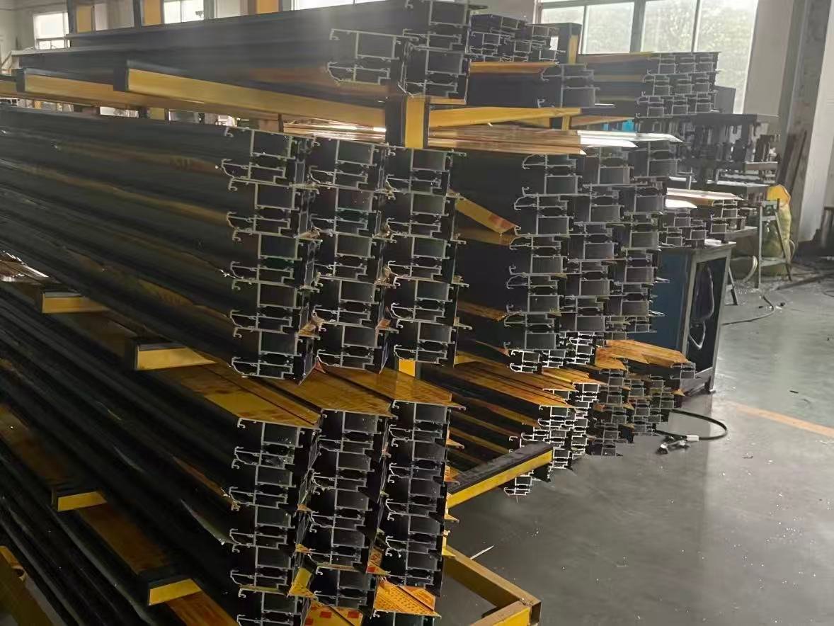 Aluminum window profile sections prepared for production