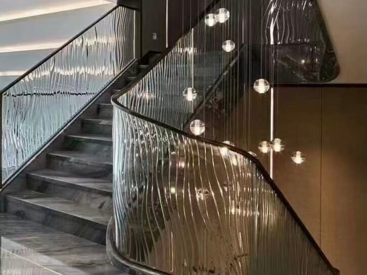 Custom metal and glass railing for interiors