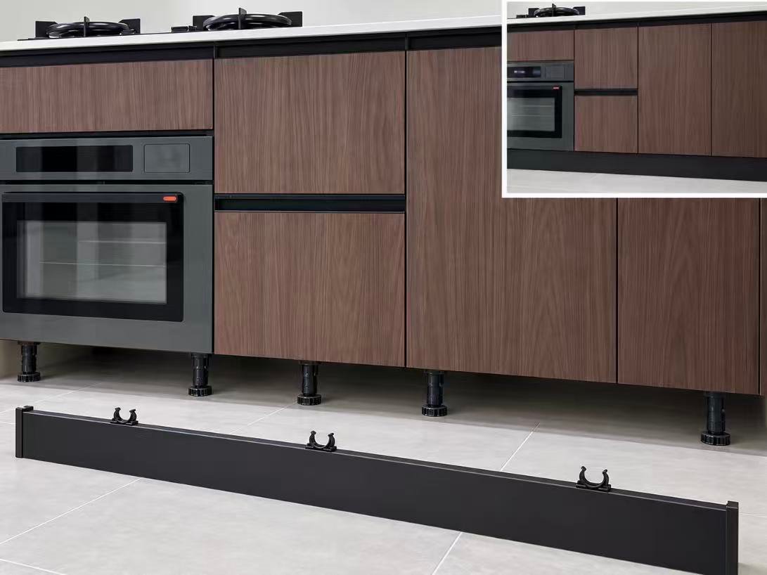 Floor level cabinet moisture protection and clearance