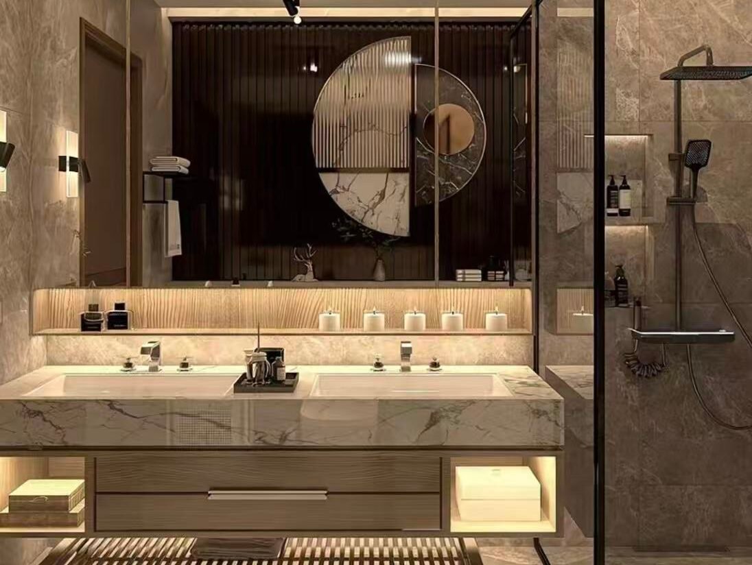 Stone vanity countertop installed in hotel bathroom