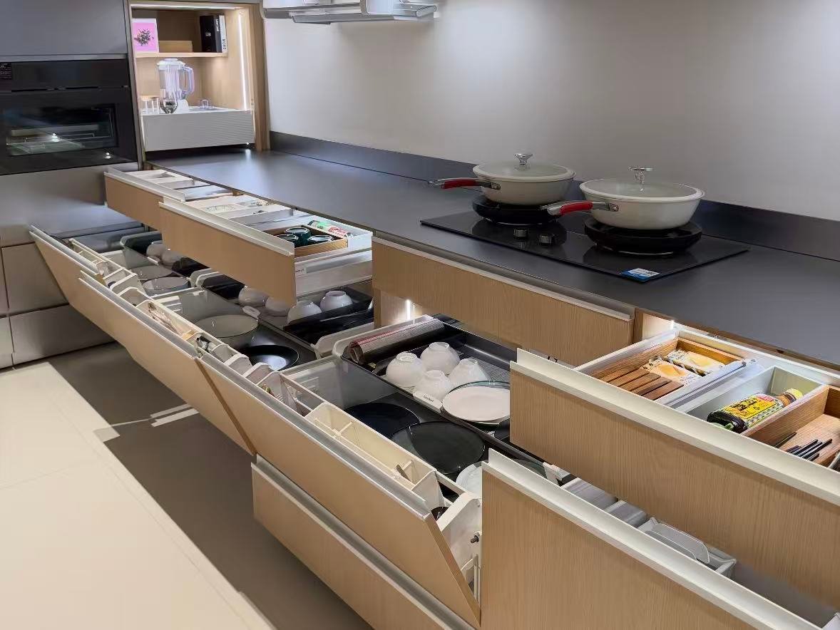 Kitchen cabinet drawer organizer system