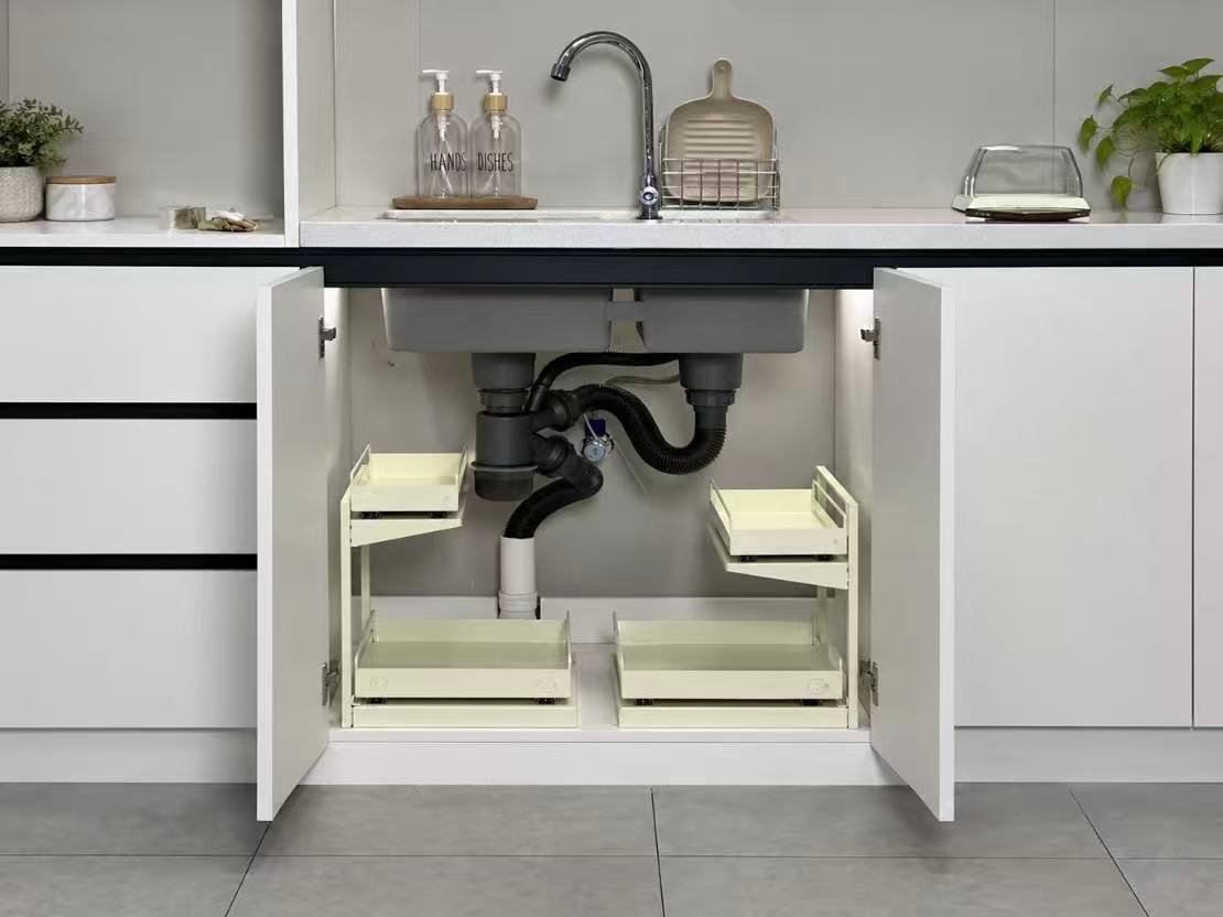 Sink base cabinet moisture protection around plumbing