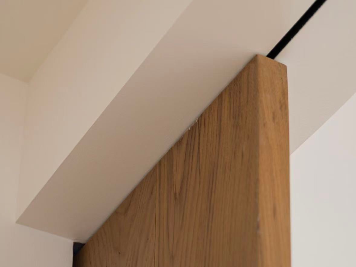 Sliding interior door track and wall clearance installation detail
