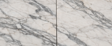 vein matched white grey marble slabs.jpg Vein matched white and grey marble slabs with continuous pattern